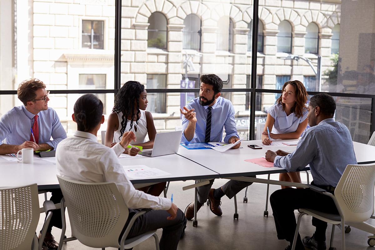 smart-looking-group-of-professionals-in-a-meeting smart-looking-group-of-professionals-in-a-meeting